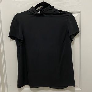 Brooks Brothers black silk short sleeve blouse with 4 buttons at neck. Size 10.
